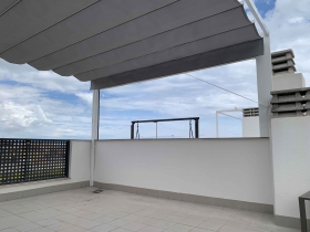 Pérgola with wind protections